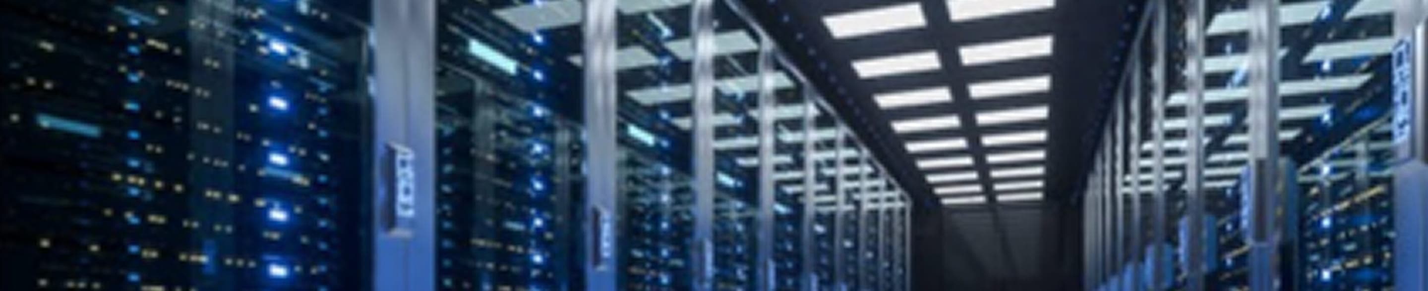 Data center corridor with illuminated server racks